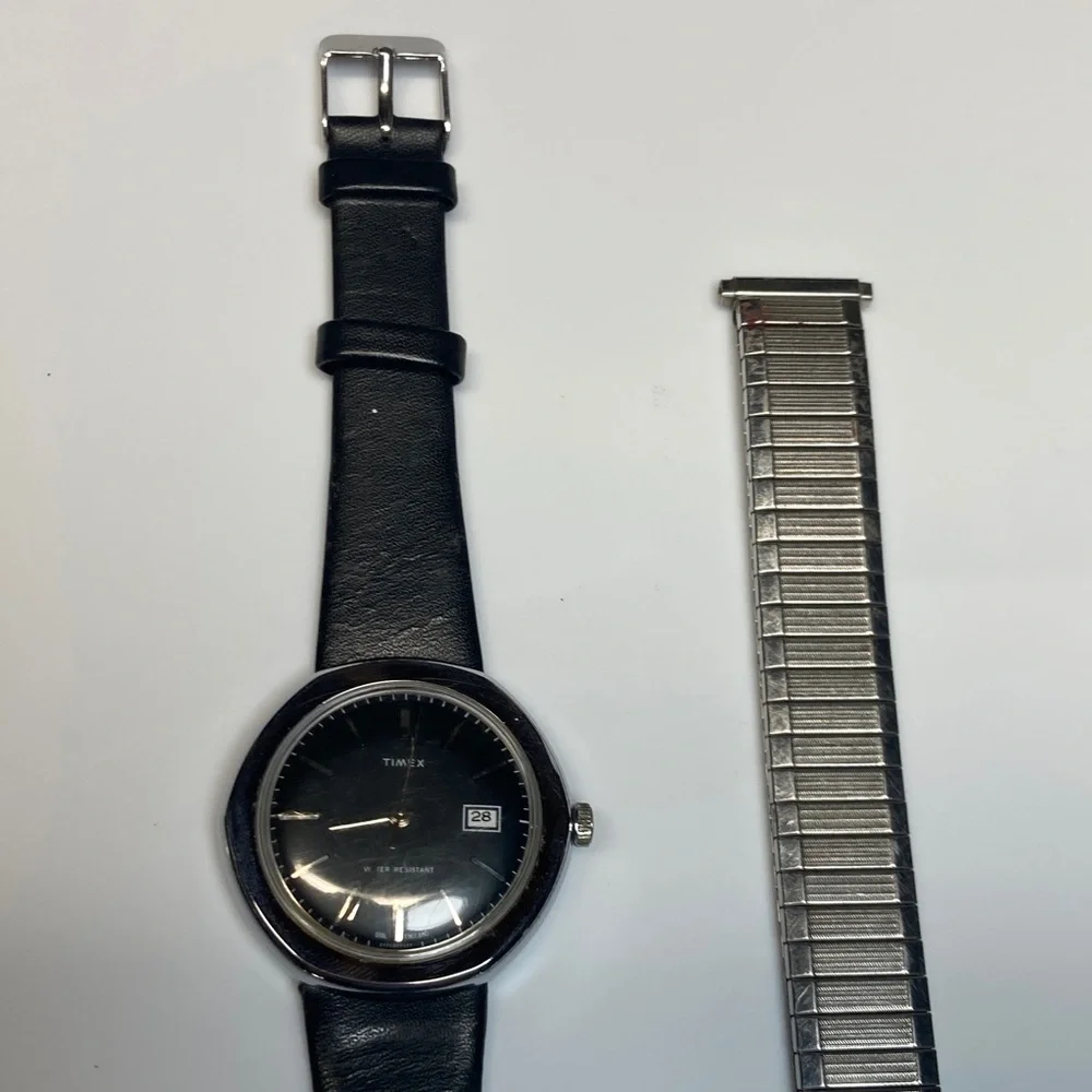Vintage Timex watch, black dial, domed crystal, 2 straps, 1 leather, 1 stainless